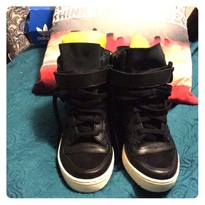 Black, suede Adidas high tops